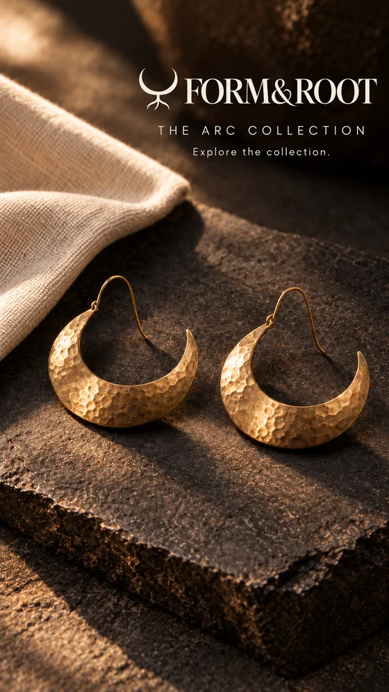 FORM & ROOT The Arc Collection: gold crescent earrings on warm ivory
